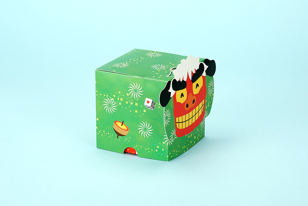 お正月向け 獅子舞型のお菓子箱 側面 独楽 サイコロ