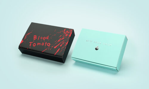 【制作実績】ブランドトマト（Blood Tomato/RED TEAR DROP）2品種贈答用N式化粧箱。カラーダンボール合紙で箱内側をデザイン。部分ニスと箔押しで高級感と品種を差別化。