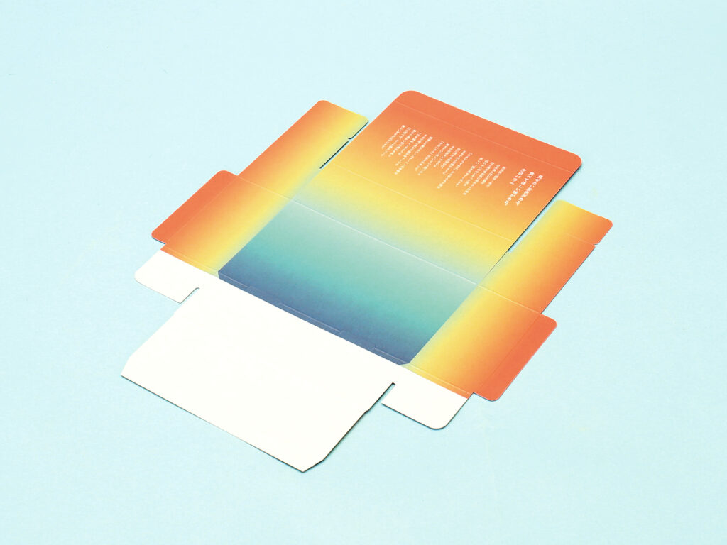 夕日のグラデーションが印刷された夕日バウム化粧箱の中面